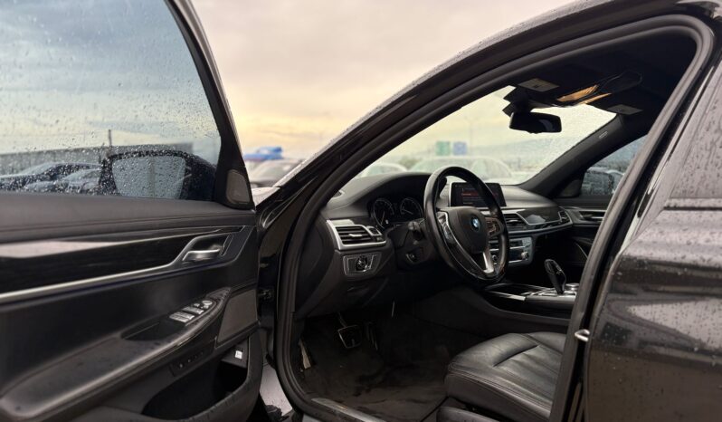 
								BMW 740i full									