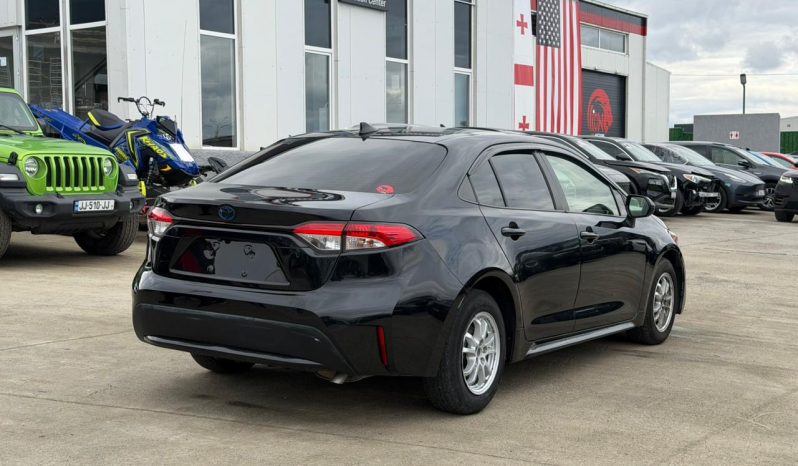 
								TOYOTA COROLLA HYBRID full									