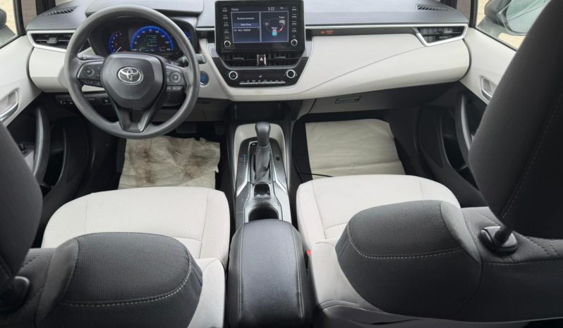 
								TOYOTA COROLLA HYBRID full									