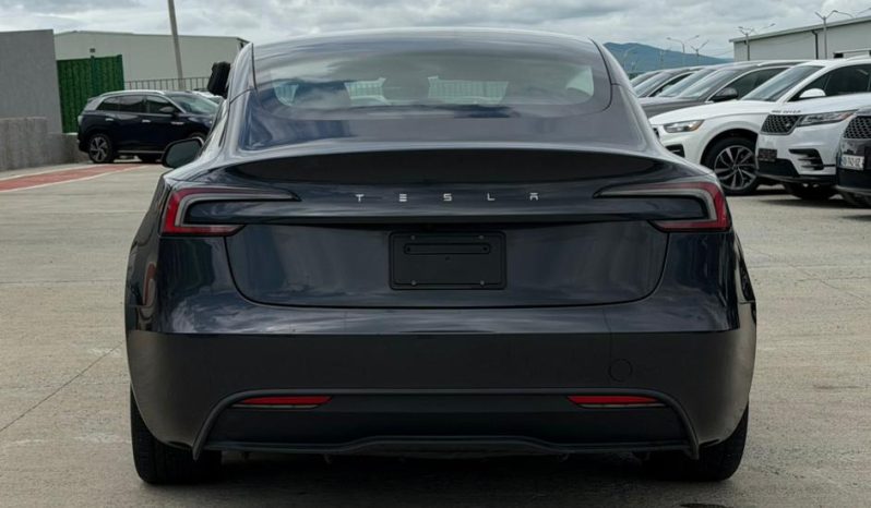 
								Tesla Model 3 full									