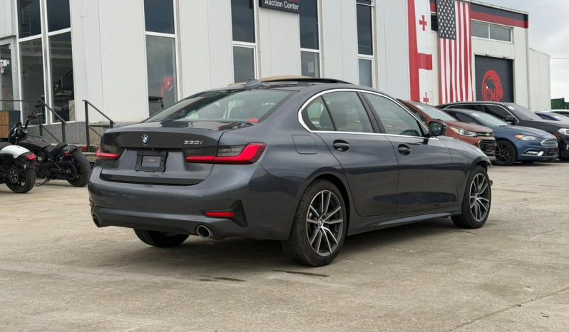 
								2020 BMW 330I full									