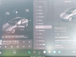 
										Tesla Model 3 full									