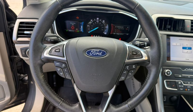 
								Ford Fusion Hybrid full									