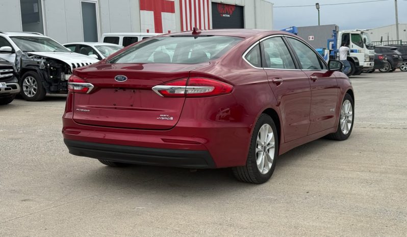 
								2019 Ford Fusion, Hybrid Sel full									