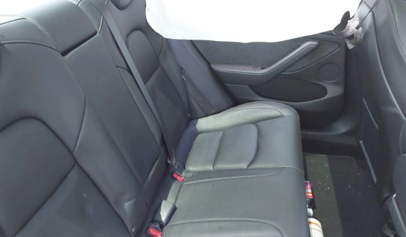 
								Tesla Model 3 full									