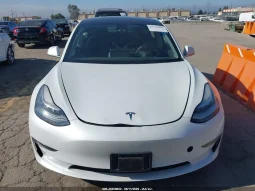 
										Tesla Model 3 full									