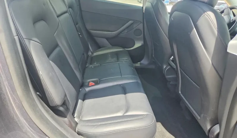 
								Tesla Model Y full									