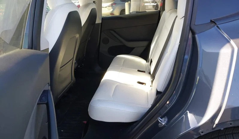 
								Tesla Model Y full									