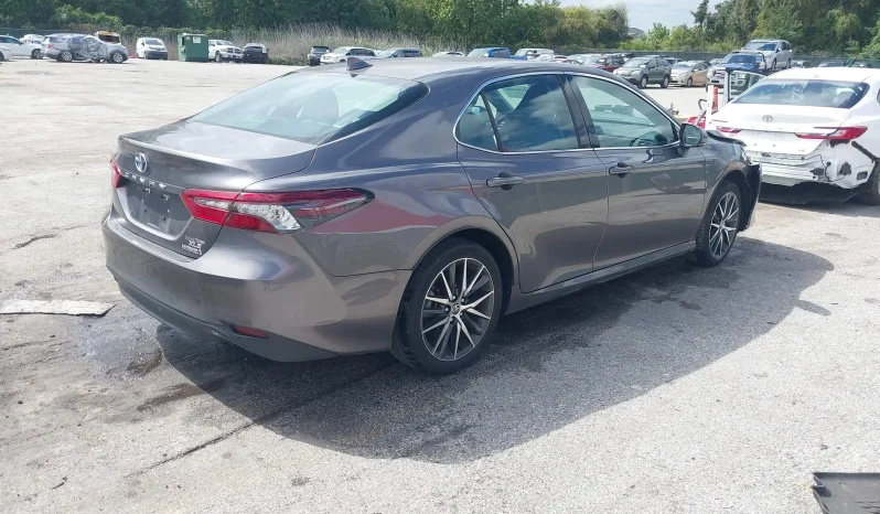 
								Toyota Camry Hybrid full									